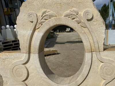 Oeil de boeuf en pierre de taille atelier bouneou